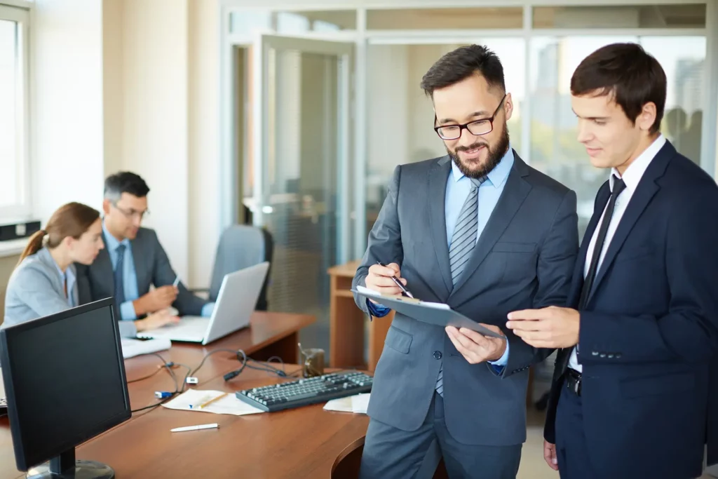 successful-businessmen-talking-each-other