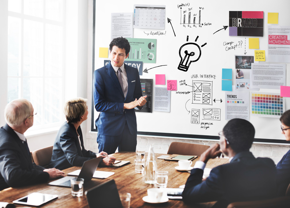 man-showing-his-ideas-to-his-colleague