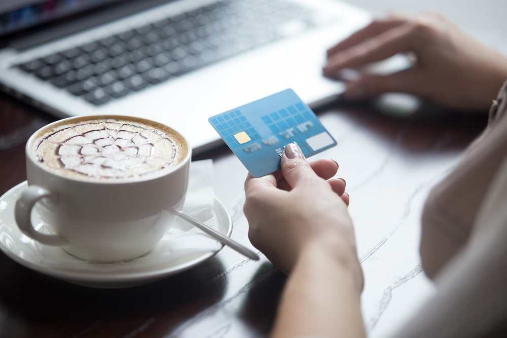 cup-of-coffee-women-holding-atm-card