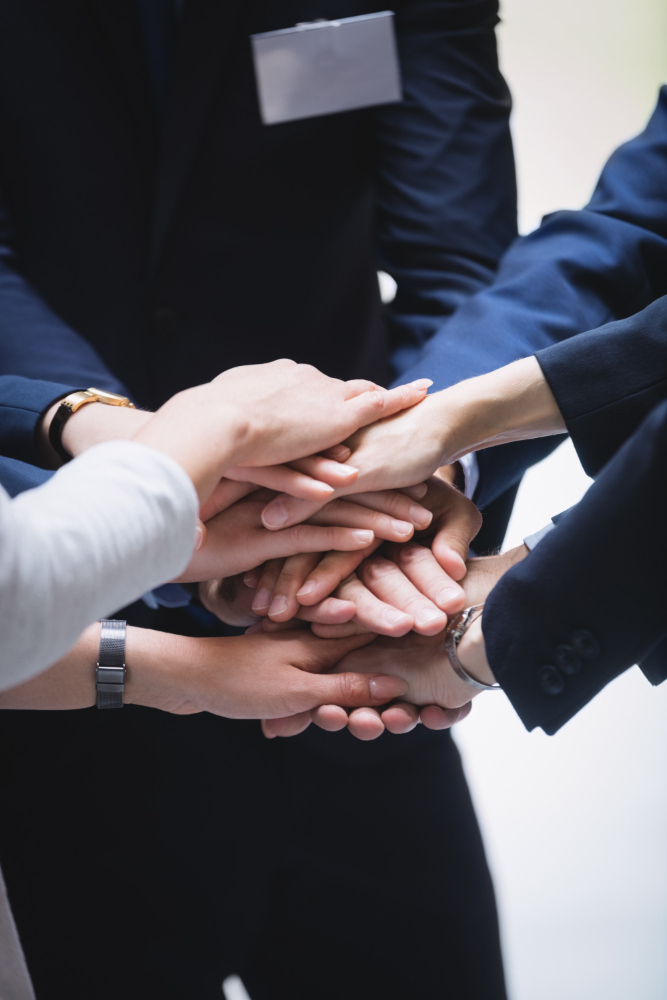 workmates-holding-hands